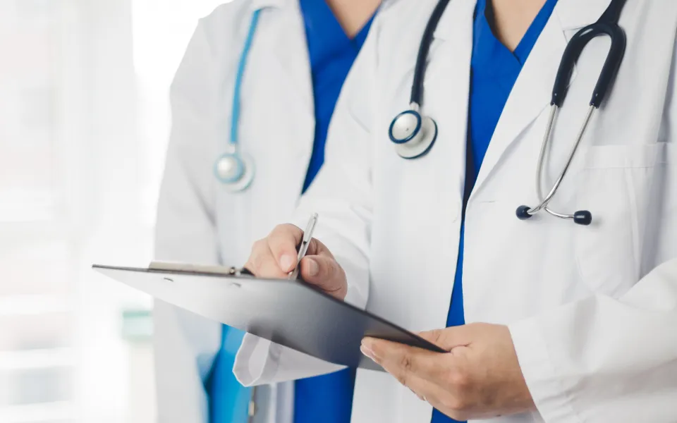 doctors blue scrubs check up